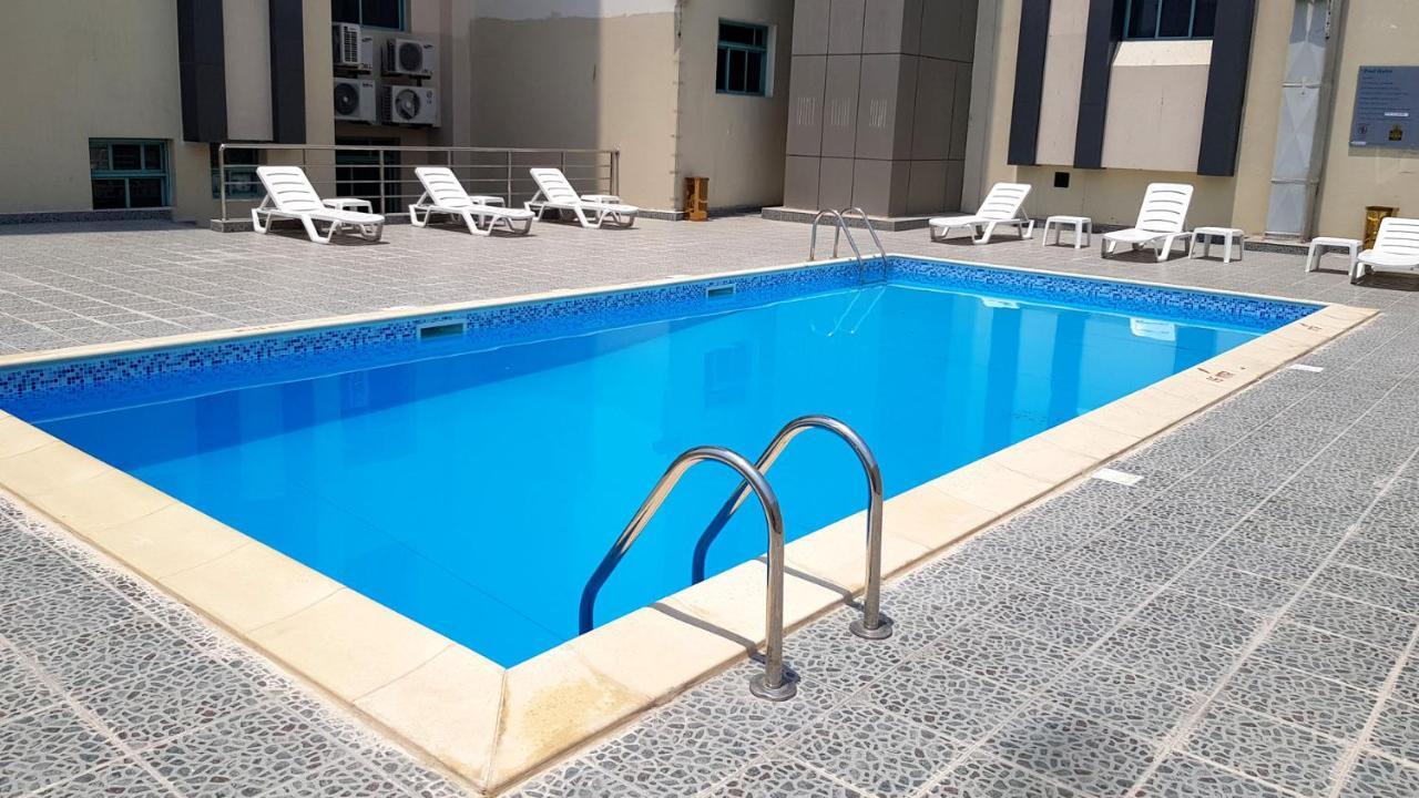 Al Muntazah Plaza Hotel Доха Екстериор снимка