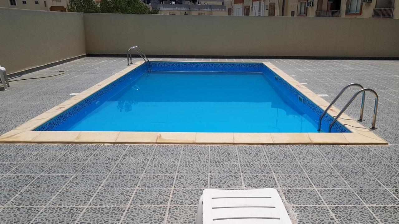 Al Muntazah Plaza Hotel Доха Екстериор снимка